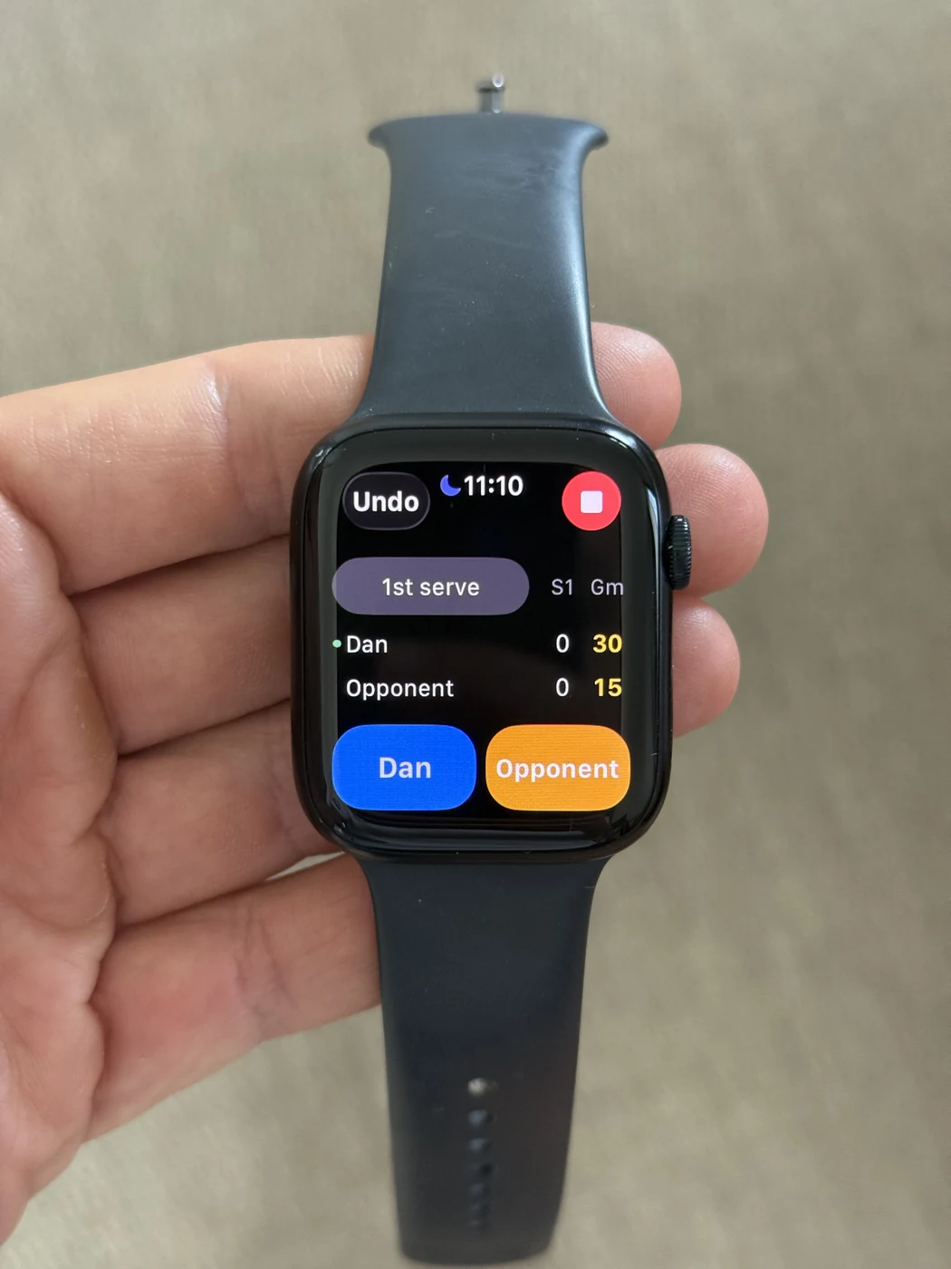 MyTennisGame live scoring on Apple Watch, with buttons to record whether Dan or the opponent won the point